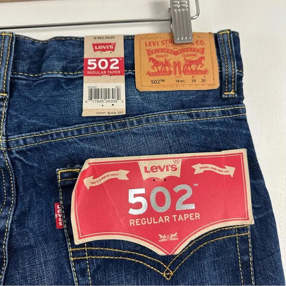 NWT LEVI'S 502 TAPER FIT MEN'S DISTRESSED BLUE SIZE 29